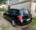 Черный Опель Астра, объемом двигателя 1.69 л и пробегом 330 тыс. км за 4100 $, фото 4 на Automoto.ua