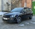 Черный Опель Астра, объемом двигателя 1.9 л и пробегом 222 тыс. км за 4200 $, фото 1 на Automoto.ua