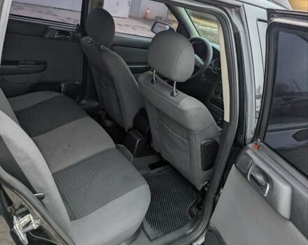 Черный Опель Астра, объемом двигателя 1.6 л и пробегом 280 тыс. км за 3850 $, фото 4 на Automoto.ua