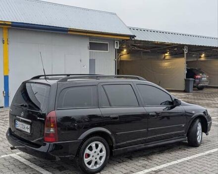 Черный Опель Астра, объемом двигателя 1.6 л и пробегом 280 тыс. км за 3850 $, фото 2 на Automoto.ua