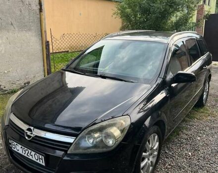 Черный Опель Астра, объемом двигателя 1.69 л и пробегом 330 тыс. км за 4100 $, фото 7 на Automoto.ua