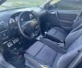 Черный Опель Астра, объемом двигателя 2 л и пробегом 200 тыс. км за 950 $, фото 6 на Automoto.ua