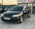 Черный Опель Астра, объемом двигателя 1.6 л и пробегом 290 тыс. км за 3300 $, фото 1 на Automoto.ua