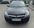 Черный Опель Астра, объемом двигателя 1.8 л и пробегом 255 тыс. км за 4700 $, фото 1 на Automoto.ua