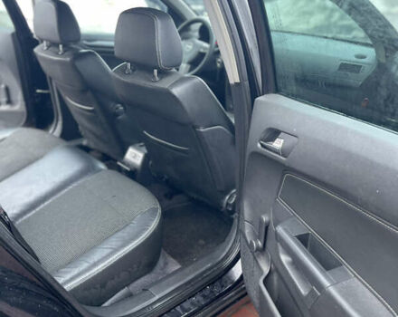 Черный Опель Астра, объемом двигателя 1.9 л и пробегом 220 тыс. км за 3750 $, фото 11 на Automoto.ua