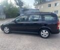Черный Опель Астра, объемом двигателя 1.6 л и пробегом 241 тыс. км за 4500 $, фото 21 на Automoto.ua