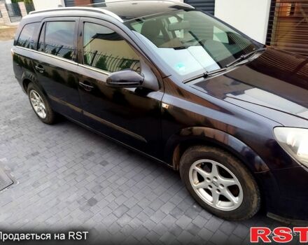 Черный Опель Астра, объемом двигателя 1.8 л и пробегом 218 тыс. км за 3500 $, фото 2 на Automoto.ua