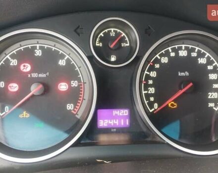 Черный Опель Астра, объемом двигателя 1.9 л и пробегом 320 тыс. км за 4999 $, фото 4 на Automoto.ua