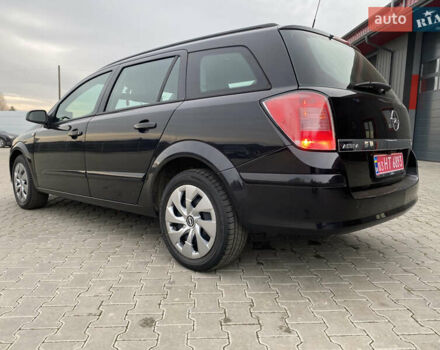 Черный Опель Астра, объемом двигателя 1.6 л и пробегом 231 тыс. км за 4800 $, фото 4 на Automoto.ua