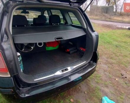 Черный Опель Астра, объемом двигателя 1.9 л и пробегом 320 тыс. км за 4999 $, фото 10 на Automoto.ua