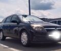 Черный Опель Астра, объемом двигателя 1.6 л и пробегом 282 тыс. км за 5327 $, фото 4 на Automoto.ua