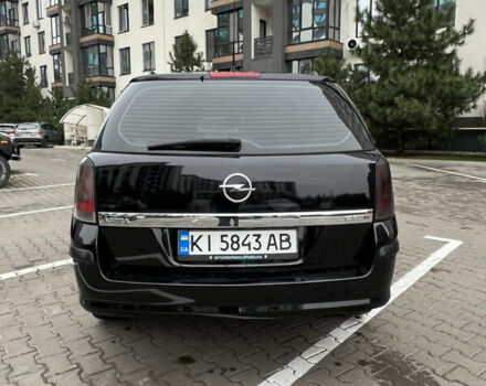 Черный Опель Астра, объемом двигателя 1.7 л и пробегом 330 тыс. км за 5200 $, фото 10 на Automoto.ua