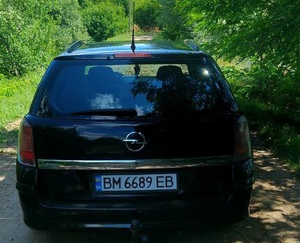 Черный Опель Астра, объемом двигателя 1.6 л и пробегом 283 тыс. км за 4400 $, фото 3 на Automoto.ua
