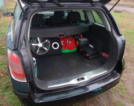 Черный Опель Астра, объемом двигателя 1.9 л и пробегом 320 тыс. км за 4999 $, фото 10 на Automoto.ua