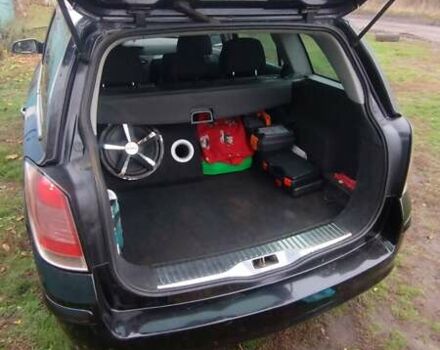 Черный Опель Астра, объемом двигателя 1.9 л и пробегом 320 тыс. км за 4999 $, фото 6 на Automoto.ua