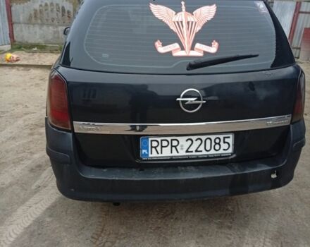 Черный Опель Астра, объемом двигателя 1 л и пробегом 276 тыс. км за 1900 $, фото 3 на Automoto.ua