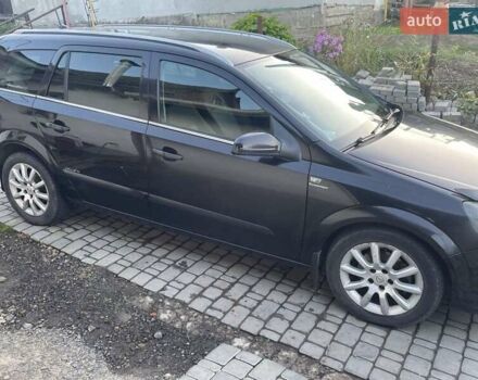 Черный Опель Астра, объемом двигателя 1.7 л и пробегом 240 тыс. км за 3500 $, фото 4 на Automoto.ua