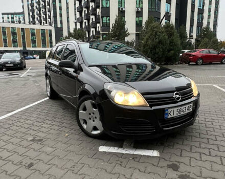 Черный Опель Астра, объемом двигателя 1.7 л и пробегом 330 тыс. км за 5200 $, фото 1 на Automoto.ua