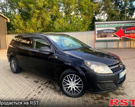 Черный Опель Астра, объемом двигателя 1.7 л и пробегом 310 тыс. км за 4650 $, фото 1 на Automoto.ua