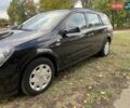 Черный Опель Астра, объемом двигателя 1.6 л и пробегом 197 тыс. км за 5500 $, фото 23 на Automoto.ua