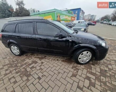 Черный Опель Астра, объемом двигателя 1.6 л и пробегом 229 тыс. км за 5400 $, фото 25 на Automoto.ua
