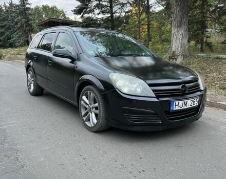 Черный Опель Астра, объемом двигателя 1.9 л и пробегом 333 тыс. км за 2600 $, фото 1 на Automoto.ua