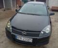 Черный Опель Астра, объемом двигателя 1 л и пробегом 276 тыс. км за 1900 $, фото 1 на Automoto.ua
