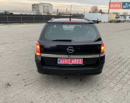 Черный Опель Астра, объемом двигателя 1.6 л и пробегом 231 тыс. км за 4800 $, фото 7 на Automoto.ua