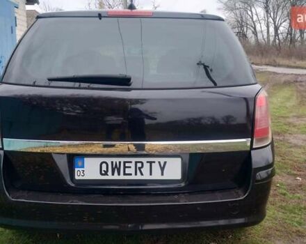 Черный Опель Астра, объемом двигателя 1.9 л и пробегом 320 тыс. км за 4999 $, фото 7 на Automoto.ua