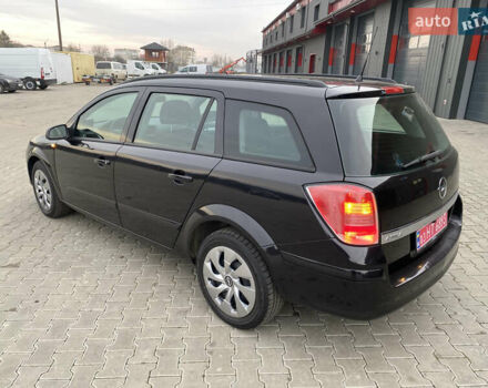 Черный Опель Астра, объемом двигателя 1.6 л и пробегом 231 тыс. км за 4800 $, фото 5 на Automoto.ua