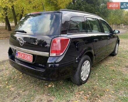 Черный Опель Астра, объемом двигателя 1.6 л и пробегом 197 тыс. км за 5500 $, фото 25 на Automoto.ua