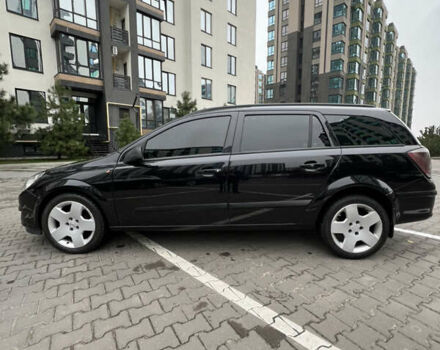 Черный Опель Астра, объемом двигателя 1.7 л и пробегом 330 тыс. км за 5200 $, фото 7 на Automoto.ua