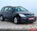 Черный Опель Астра, объемом двигателя 1.6 л и пробегом 230 тыс. км за 5400 $, фото 1 на Automoto.ua