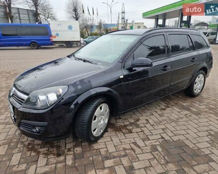 Черный Опель Астра, объемом двигателя 1.6 л и пробегом 229 тыс. км за 5400 $, фото 7 на Automoto.ua