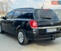 Черный Опель Астра, объемом двигателя 1.6 л и пробегом 258 тыс. км за 4499 $, фото 7 на Automoto.ua