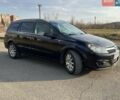 Черный Опель Астра, объемом двигателя 1.7 л и пробегом 440 тыс. км за 3150 $, фото 16 на Automoto.ua