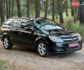 Черный Опель Астра, объемом двигателя 1.6 л и пробегом 230 тыс. км за 5350 $, фото 1 на Automoto.ua