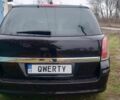 Черный Опель Астра, объемом двигателя 1.9 л и пробегом 320 тыс. км за 4999 $, фото 3 на Automoto.ua