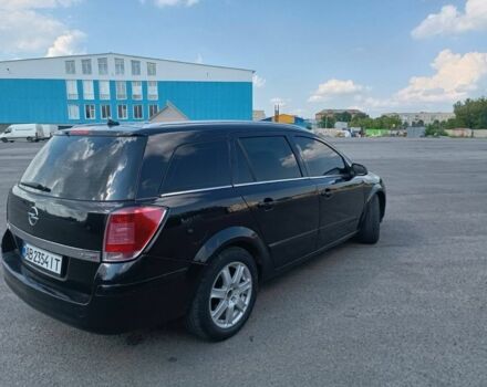 Черный Опель Астра, объемом двигателя 1.9 л и пробегом 250 тыс. км за 4500 $, фото 2 на Automoto.ua