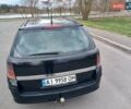 Черный Опель Астра, объемом двигателя 1.9 л и пробегом 312 тыс. км за 4200 $, фото 1 на Automoto.ua