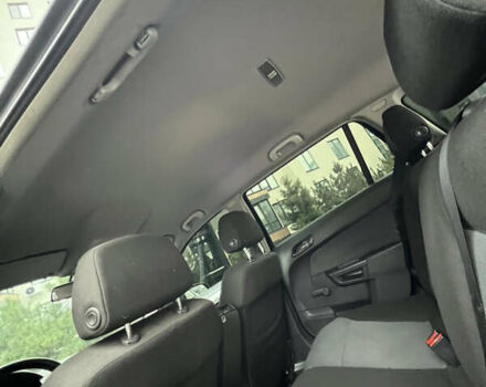 Черный Опель Астра, объемом двигателя 1.7 л и пробегом 330 тыс. км за 5200 $, фото 21 на Automoto.ua