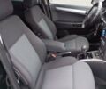Черный Опель Астра, объемом двигателя 1.6 л и пробегом 293 тыс. км за 4200 $, фото 13 на Automoto.ua