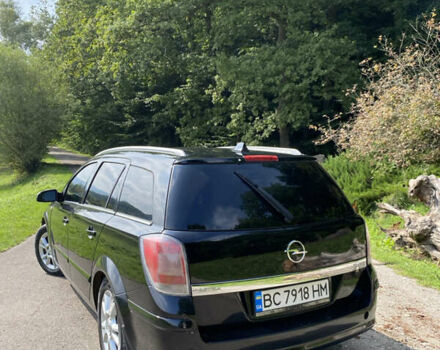 Черный Опель Астра, объемом двигателя 1.91 л и пробегом 295 тыс. км за 5200 $, фото 3 на Automoto.ua