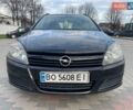 Черный Опель Астра, объемом двигателя 1.7 л и пробегом 250 тыс. км за 3950 $, фото 1 на Automoto.ua