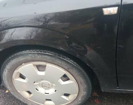 Черный Опель Астра, объемом двигателя 1.69 л и пробегом 387 тыс. км за 3500 $, фото 11 на Automoto.ua