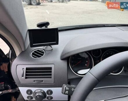 Черный Опель Астра, объемом двигателя 1.6 л и пробегом 229 тыс. км за 4900 $, фото 9 на Automoto.ua