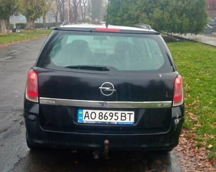 Черный Опель Астра, объемом двигателя 1.69 л и пробегом 387 тыс. км за 3500 $, фото 7 на Automoto.ua