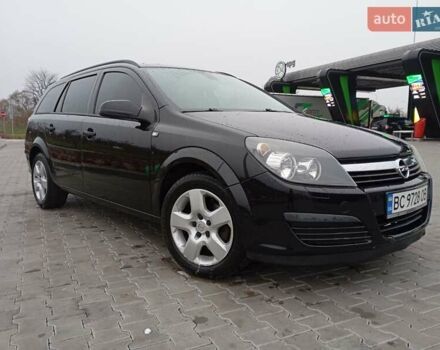 Черный Опель Астра, объемом двигателя 1.6 л и пробегом 293 тыс. км за 4200 $, фото 4 на Automoto.ua