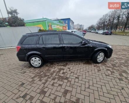 Черный Опель Астра, объемом двигателя 1.6 л и пробегом 229 тыс. км за 5400 $, фото 18 на Automoto.ua