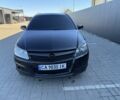 Черный Опель Астра, объемом двигателя 1.6 л и пробегом 237 тыс. км за 5000 $, фото 1 на Automoto.ua